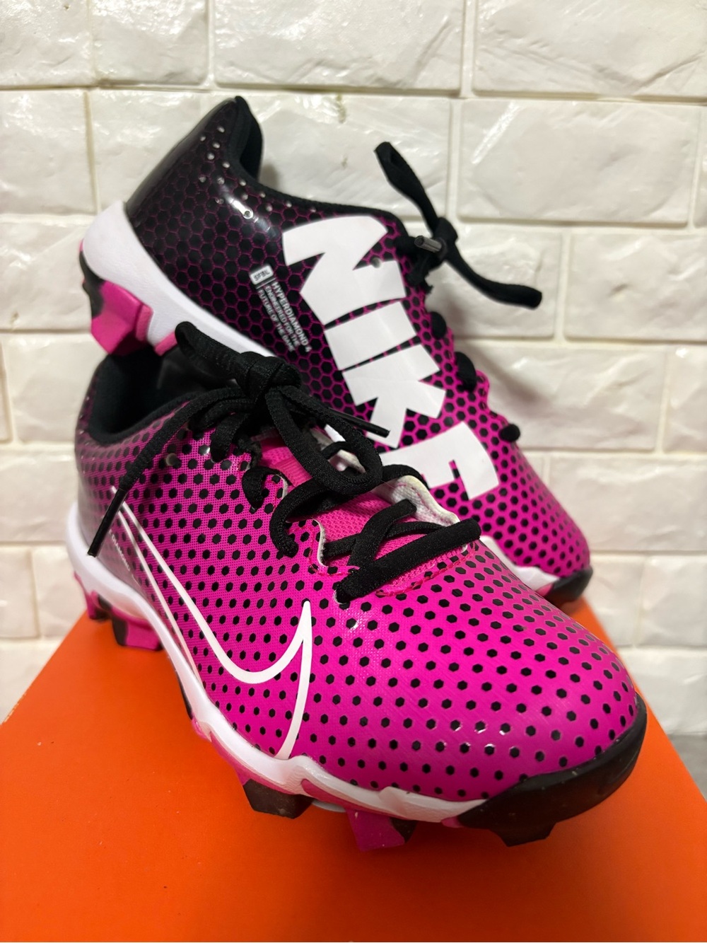 Nike Kids' Pink and Black Softball Cleats with White Swoosh